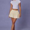 Bow-Detail Broderie Anglaise Mini Skirt in Ivory