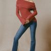 Ribbed-Knit Asymmetric Off-Shoulder Jumper in Brick Red