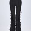 Ruffled Mid-Rise Flared Trousers in Black