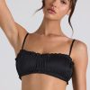 Ruffle-Trim Smocked Crop Top in Black