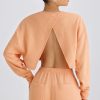 Textured Cotton Jersey Open-Back Cropped Sweatshirt in Peach