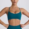Super Sculpt Seamless Cross-Back Sports Bra in Teal